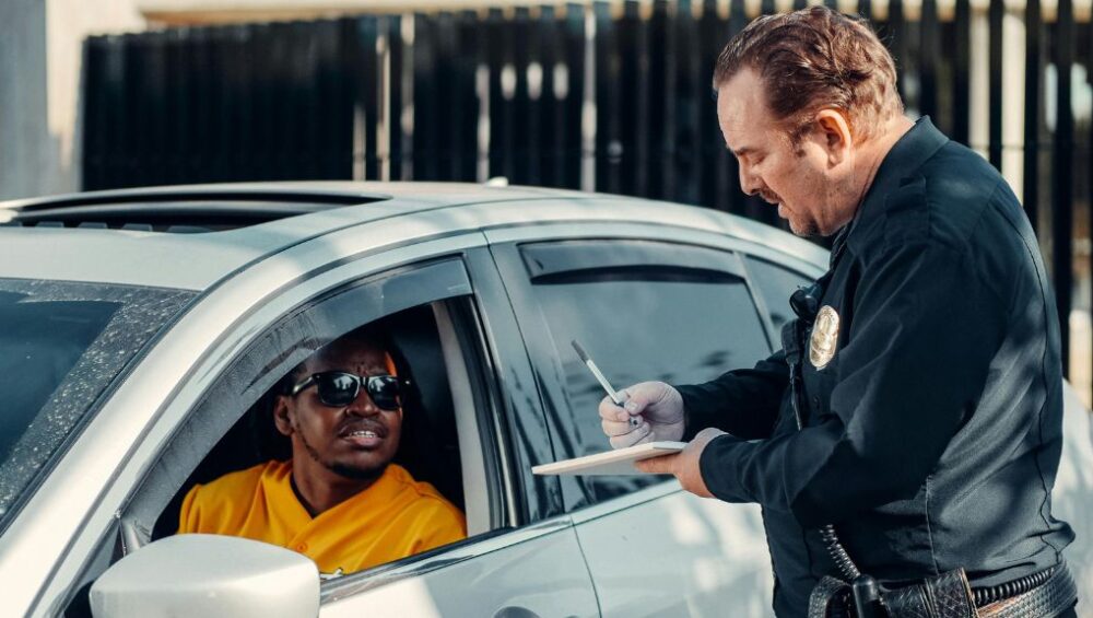man filing a police report after collision